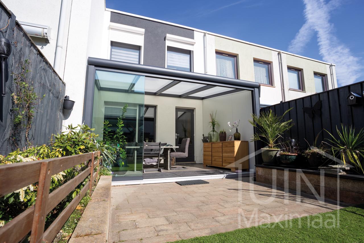 Small anthracite veranda in a garden