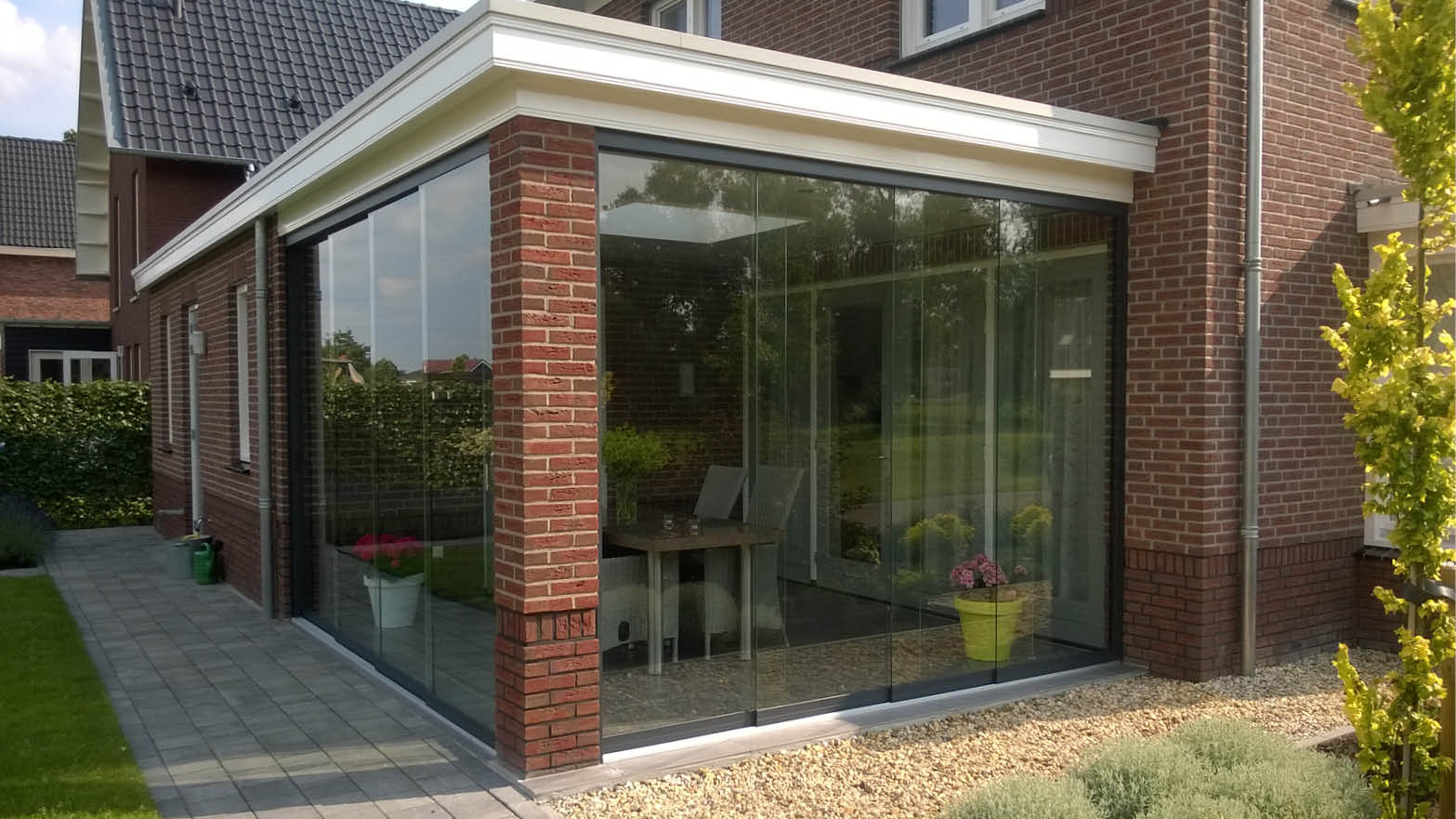 Veranda with glass sliding doors and Shading Panels