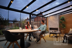 Gumax® LED lighting in anthracite-coloured patio cover with glass roof and glass sliding doors