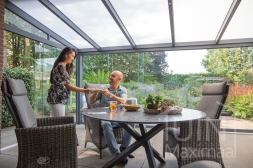 Large veranda with glass sliding doors and lighting