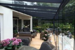 Glass sliding doors with glass roof and wedge