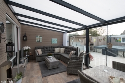 Veranda in anthracite with glass sliding door