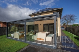 Modern pergola with glass sliding doors