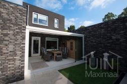 Matt white veranda in small garden