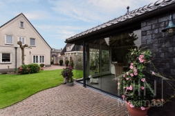 Glass sliding doors in garden room