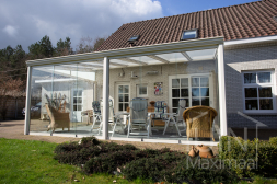 Classic white veranda with glass sliding doors