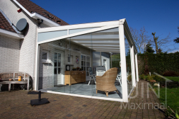 Classic white veranda with glass sliding doors and an glass wedge