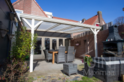 Classic white veranda with opal polycarbonate roof