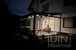 Gumax® LED lighting with glass sliding doors in a modern garden canopy