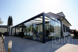 Large pergola with glass sliding door