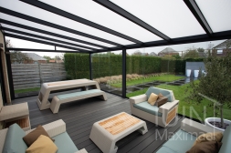 Garden room with glass sliding door and decking