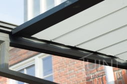 Gumax Electric underdeck Sun Shading in matt anthracite under veranda